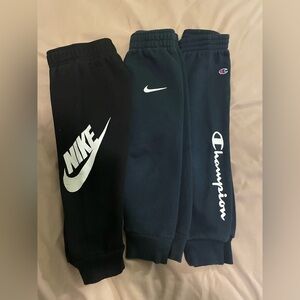 3T Boys - sweatpants 
2 Nike, 1 Champion 
Dark blue & black 
All 3 for $15